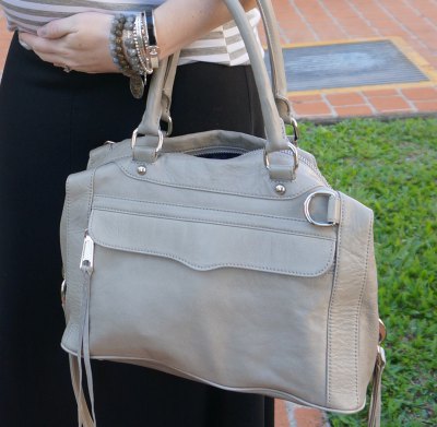 pale pink soft leather handbag with gray and white striped t-shirt