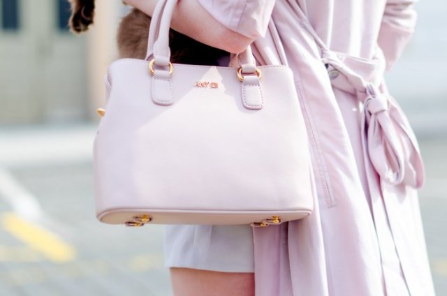 Ivory long wool coat with white soft leather handbag