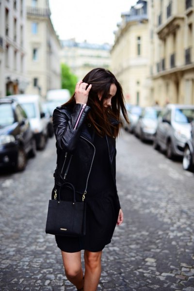 black leather jacket with mini sheath dress and handbag