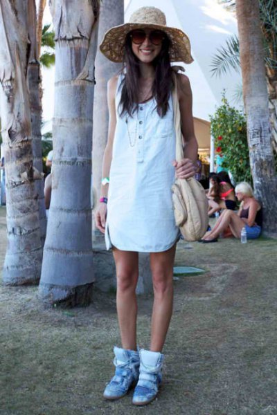 White mini shift dress with light blue sneakers with hidden wedge heels
