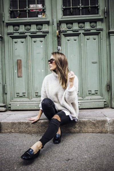 White ribbed turtleneck sweater with black leather loafers