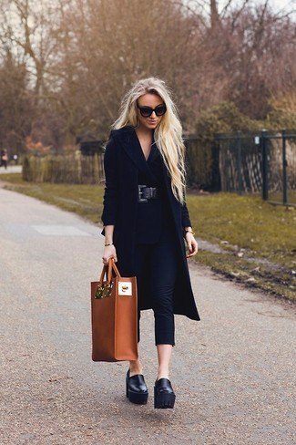 Long black wool coat with leather platform slippers