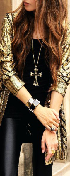 Long cardigan with shiny gold sequins and black leather leggings
