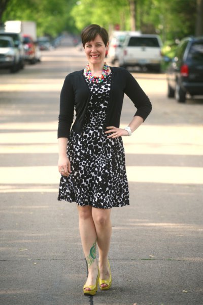 Black fitted cardigan with flared leopard print knee length dress