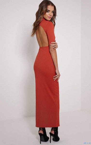 Red maxi dress with high neck and open back and black ballet flats