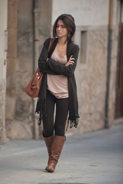 Dark gray fringed cardigan, pale pink scoop neck top and brown leather boots