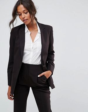 Black suit with white shirt with button collar