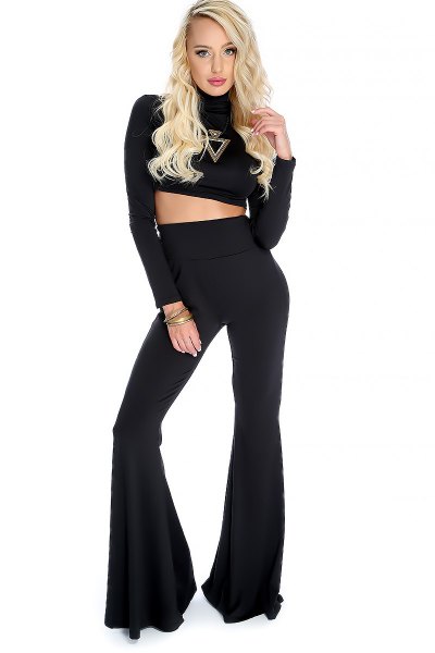 Black long sleeve bodycon crop top with high waisted flared
pants
