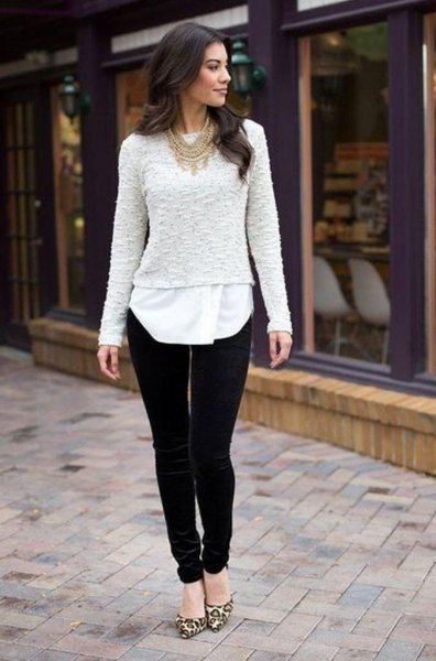 white lace sweater over tunic blouse and black velvet pants
