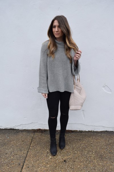 Gray cowl neck top and black super skinny jeans