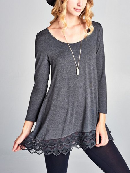 Gray long sleeve tunic t-shirt with a bateau neckline and lace hem
and black leggings