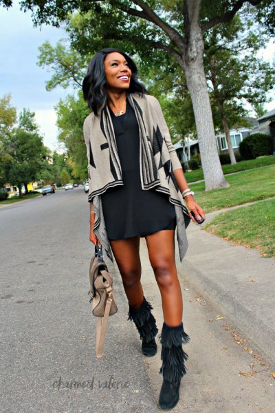 Gray cardigan with black mini sheath dress and fall boots with mid-calf fringes
