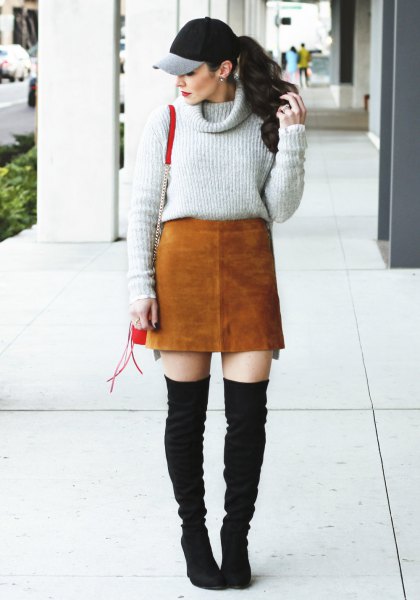 gray turtleneck with brown suede skirt and black thigh high fall boots