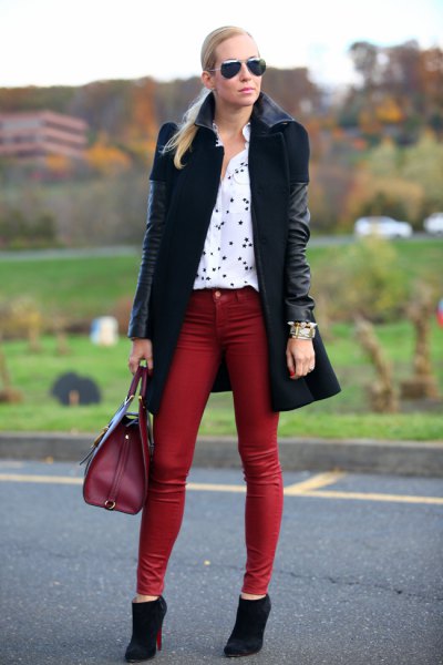 Black long leather jacket with brown coated skinny ankle jeans