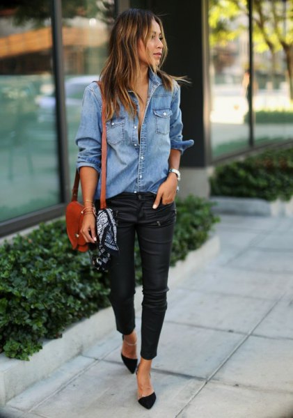 Light blue button down chambray shirt and black waxed skinny jeans