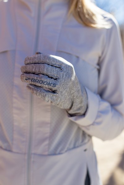 light gray nylon running jacket with matching gloves