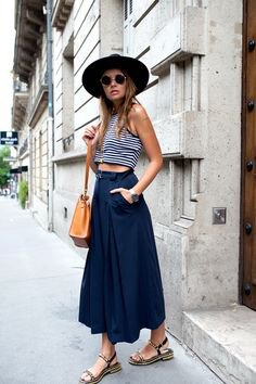 Black and white striped cropped tank top with navy maxi flared skirt