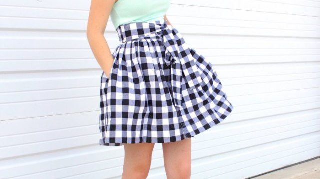 Fitted halterneck top with black and white checked mini skater skirt