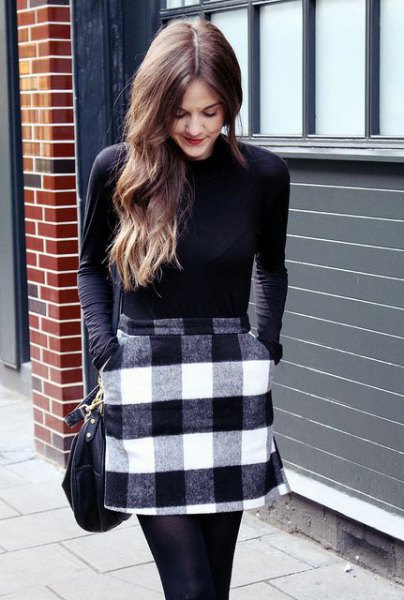 black long sleeve fitted t-shirt with gray and white checked wool mini skirt with pockets