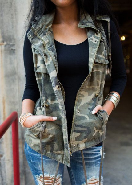 Camo vest with badly ripped boyfriend jeans