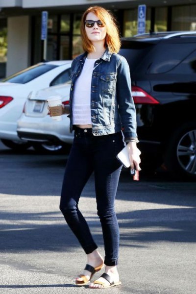 blue denim jacket with white cropped t-shirt and dark jeans