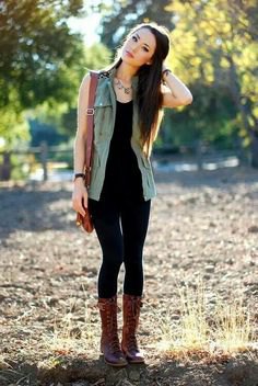 Black tank top with matching skinny jeans and medium-high lace-up
boots