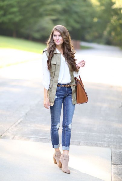 white blouse with tan waistcoat and gray suede ankle boots