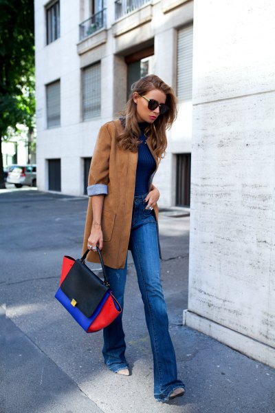 Oversized camel suede blazer with blue jeans and black leather boots