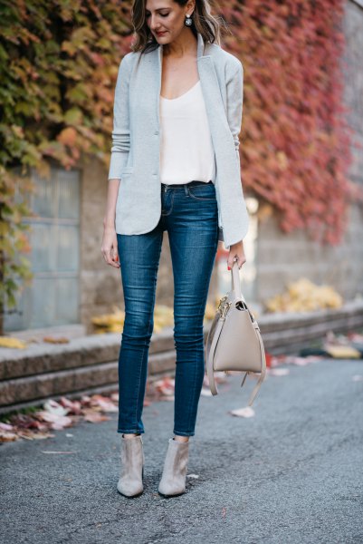 light gray blazer with white scoop neck tank top and cropped jeans