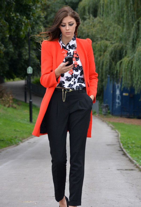 An oversized blazer goes best with a black and white printed button
down shirt and chinos
