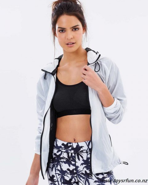 Black, short spaghetti strap top with a white jacket