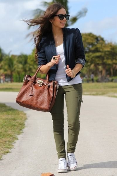 Black blazer with three quarter sleeves, white tank top and olive green trousers
