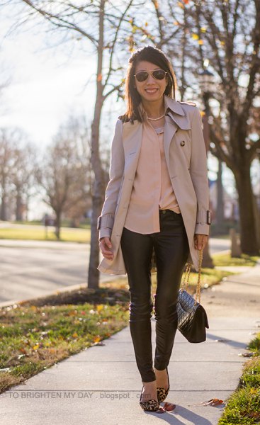blush shirt with pink trench coat and leather leggings