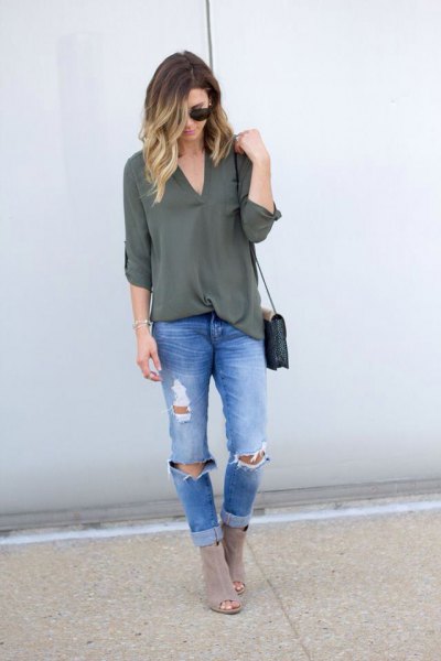 Green chiffon tunic top with V-neck and boyfriend jeans
