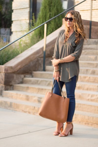green chiffon blouse with orange-brown leather handbag