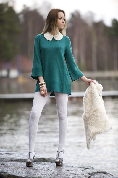 White tunic top with bell sleeves and white leggings