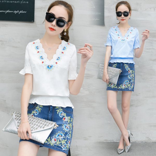 White top with a scalloped neckline, gathered waist and florally
embroidered denim skirt