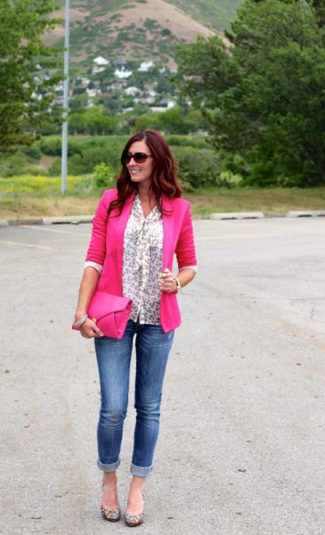 White blouse with bow and neon pink blazer and jeans