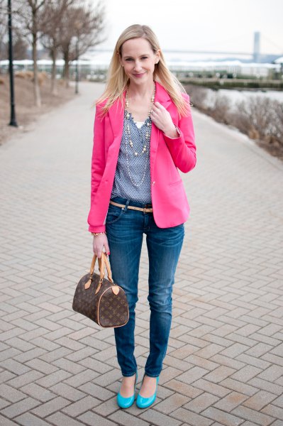 Pink blazer with blue polka dot V-neck blouse and skinny jeans