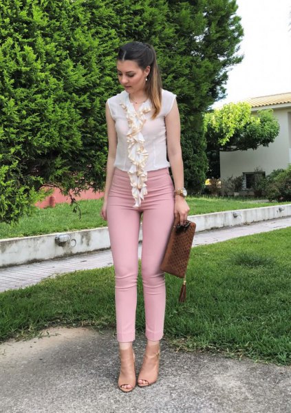 White cap sleeve shirt and blush ankle length skinny jeans