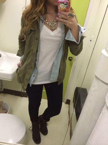 olive drab military jacket with light blue chambray shirt