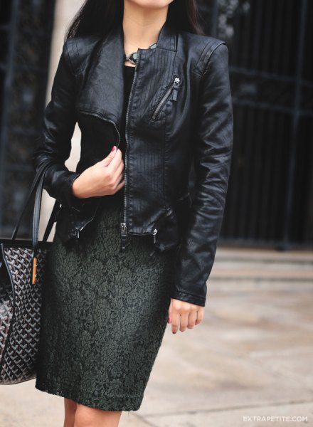 black jacket with knee-length, dark green embroidered dress