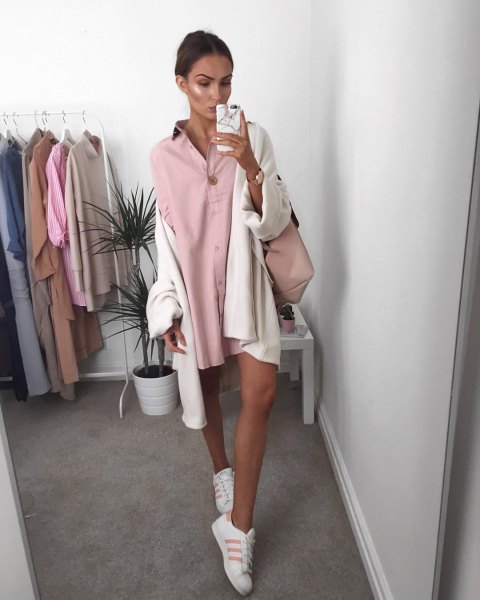 Pink button down mini shirt dress and white oversized cardigan