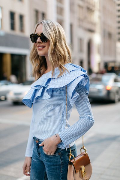 Light blue long-sleeved ruffle blouse