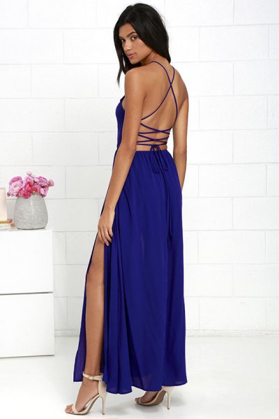 backless dark blue maxi dress with high slit and open toe
heels