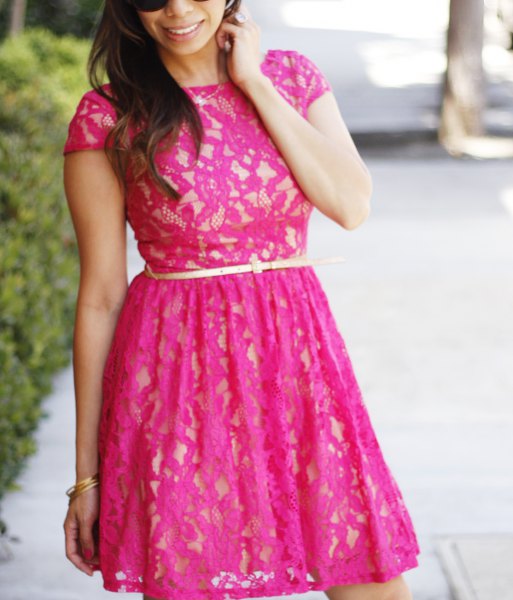 Mini fit and flare dress in pink with belt and white heels