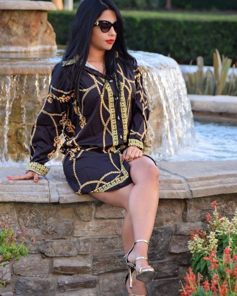 Black and gold mini shirt dress with silver ankle strap open toe heels