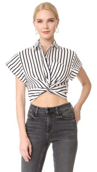 Black and white twist front cropped top with cap sleeves and gray jeans