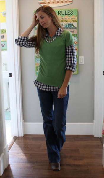 Black and white checked shirt with green short-sleeved sweater
