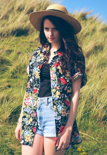 Black and white floral printed oversized Hawaiian shirt with straw hat